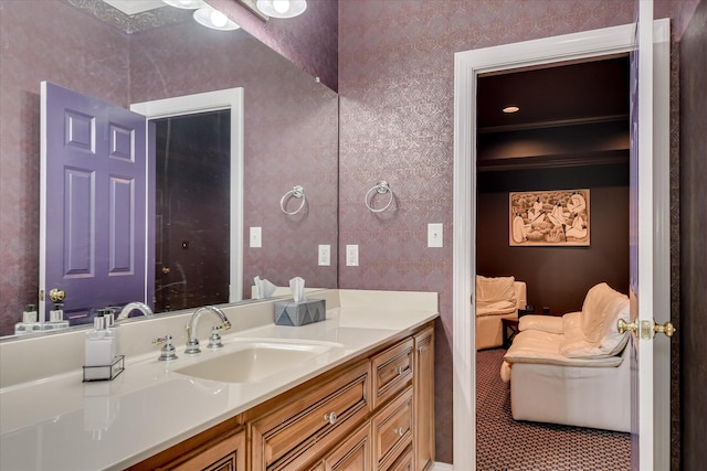 bathroom with ensuite bathroom and vanity
