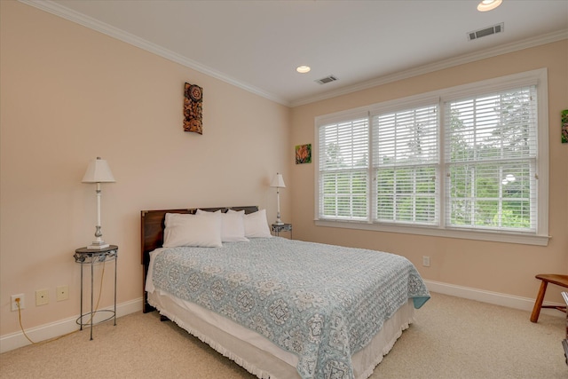 bedroom with multiple windows, carpet flooring, and visible vents