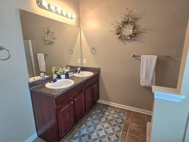 2144 Willhaven Dr, Augusta, GA 30909 - bathroom featuring double vanity, tile patterned floors, and a shower with door