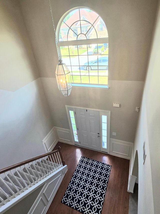 2144 Willhaven Dr, Augusta, GA 30909 - foyer with plenty of natural light, wood finished floors, a high ceiling, stairs, and a wainscoted wall