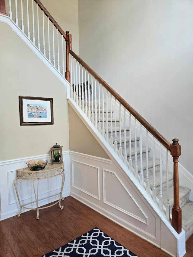 2144 Willhaven Dr, Augusta, GA 30909 - staircase featuring wood finished floors, wainscoting, and a decorative wall