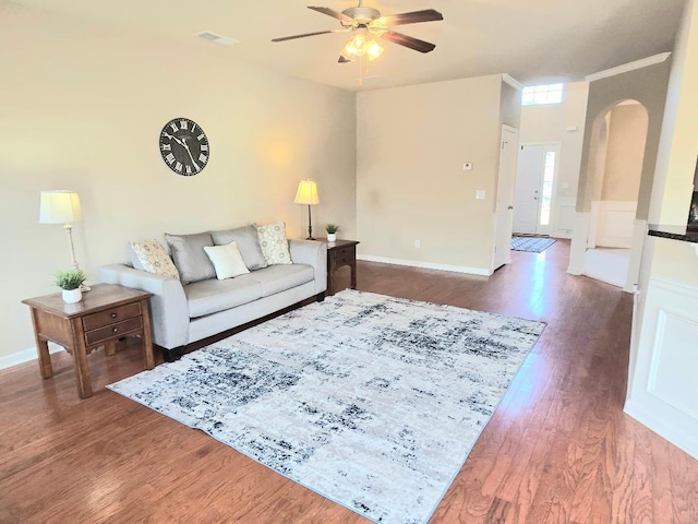 2144 Willhaven Dr, Augusta, GA 30909 - living area with a ceiling fan, wood finished floors, arched walkways, and crown molding