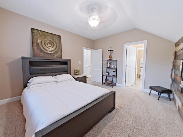 bedroom featuring light carpet, vaulted ceiling, and ceiling fan