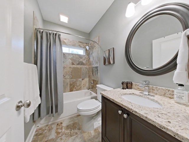 full bathroom with shower / bath combo, vanity, and toilet