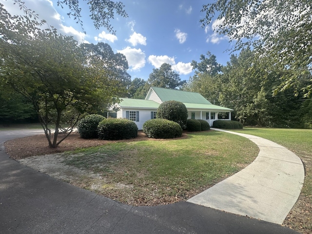 view of front of home with a front yard