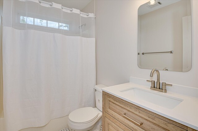 4002 Hidden Haven Ct, Augusta, GA 30909 - full bath with toilet, vanity, and shower / tub combo with curtain