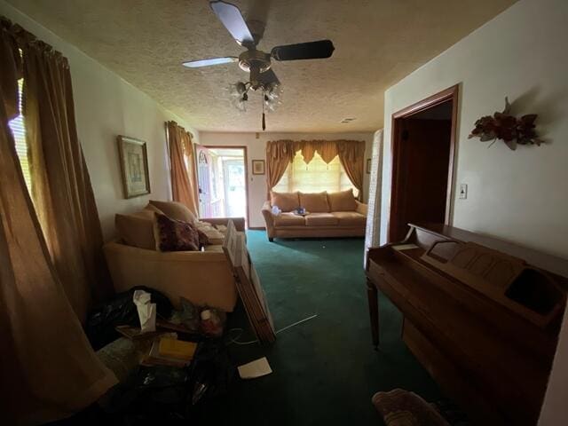 1012 14th Ave, Augusta, GA 30901 - sitting room featuring carpet, a textured ceiling, and a ceiling fan