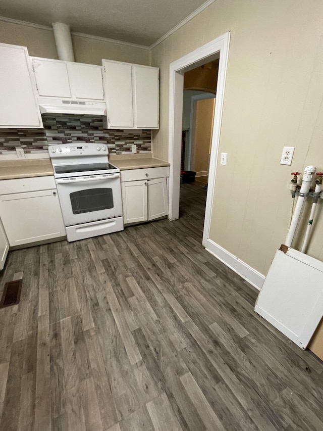 kitchen with dark hardwood / wood-style floors, white cabinetry, electric stove, and crown molding