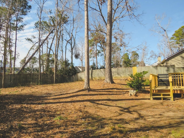 view of yard with a deck