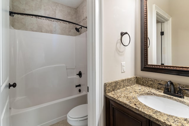 full bathroom with shower / washtub combination, vanity, and toilet