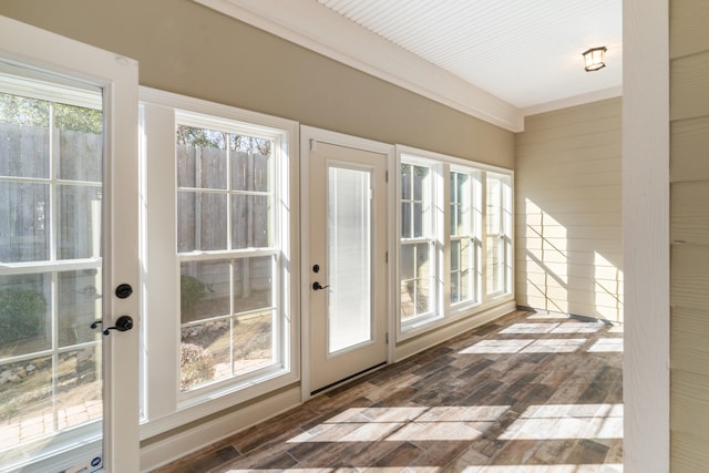 doorway with dark wood-type flooring