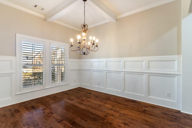 empty room featuring beam ceiling, crown molding, dark wood-type flooring, and a chandelier