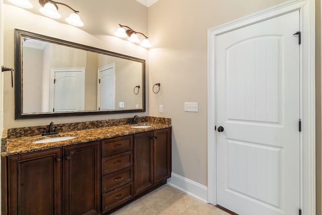 bathroom featuring tile patterned floors and vanity