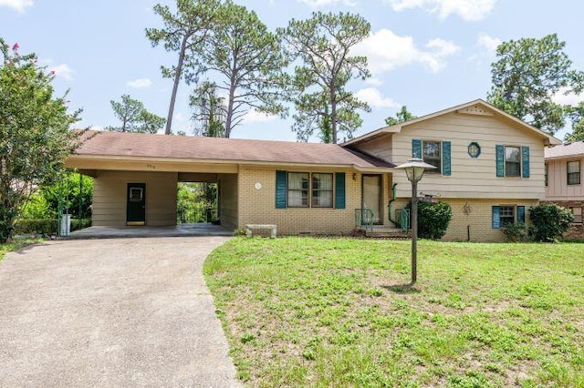 split level home with a carport and a front lawn