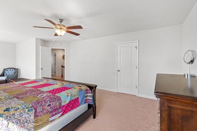bedroom with baseboards, ceiling fan, and light carpet