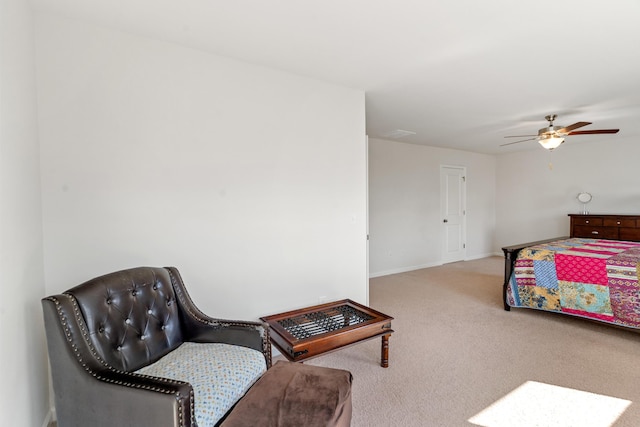bedroom featuring baseboards, ceiling fan, and carpet flooring