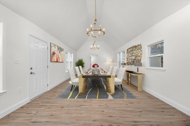 321 Padrick St, Martinez, GA 30907 - dining space featuring a chandelier, wood finished floors, plenty of natural light, vaulted ceiling, and baseboards