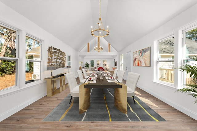 321 Padrick St, Martinez, GA 30907 - dining room featuring a chandelier, wood finished floors, baseboards, and high vaulted ceiling