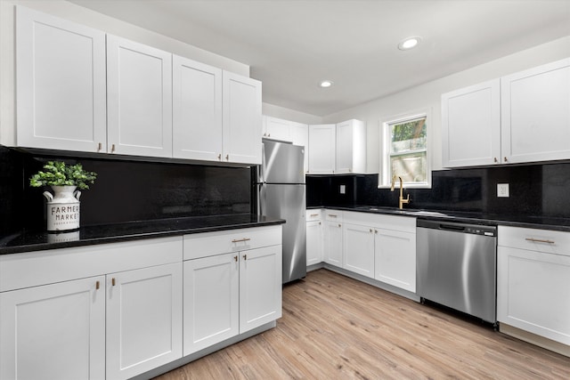 321 Padrick St, Martinez, GA 30907 - kitchen featuring stainless steel appliances, tasteful backsplash, light wood finished floors, white cabinets, and recessed lighting