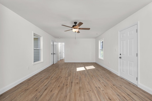 321 Padrick St, Martinez, GA 30907 - unfurnished living room with ceiling fan, light wood-style floors, and baseboards