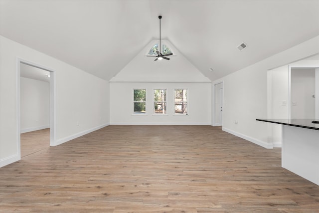 321 Padrick St, Martinez, GA 30907 - unfurnished living room featuring light wood finished floors, lofted ceiling, a ceiling fan, and baseboards