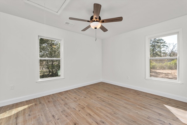 321 Padrick St, Martinez, GA 30907 - unfurnished room featuring attic access, plenty of natural light, and baseboards