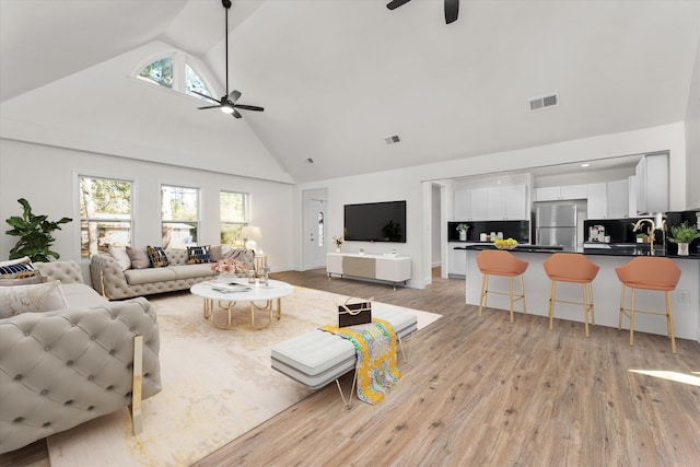 321 Padrick St, Martinez, GA 30907 - living area with a ceiling fan, high vaulted ceiling, plenty of natural light, and light wood-type flooring