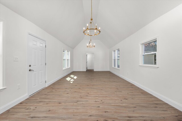 321 Padrick St, Martinez, GA 30907 - entryway with a chandelier, light wood-style floors, vaulted ceiling, and baseboards