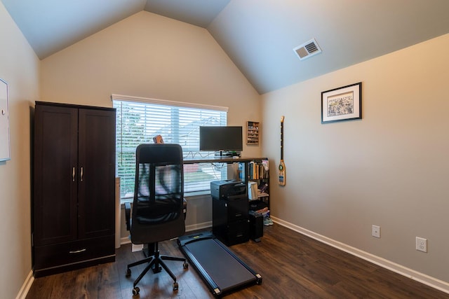 office featuring baseboards, vaulted ceiling, dark wood-style flooring, and visible vents