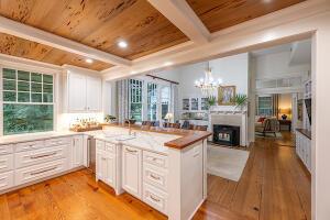 1792 Appleton Rd, Allendale, SC 29810 - kitchen featuring a chandelier, white cabinetry, and wood ceiling