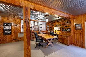 1792 Appleton Rd, Allendale, SC 29810 - home office with built in shelves and wooden walls