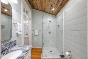 1792 Appleton Rd, Allendale, SC 29810 - bathroom featuring a shower with shower door, vanity, wooden ceiling, and lofted ceiling