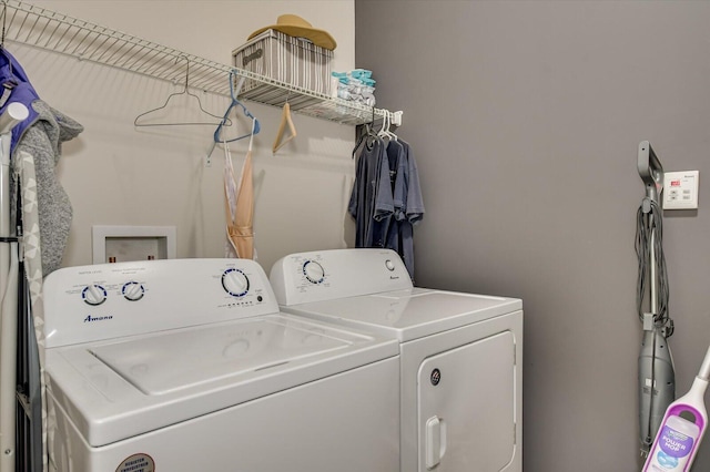 laundry area featuring washing machine and dryer