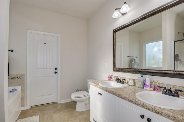 bathroom with toilet, a tub, and vanity