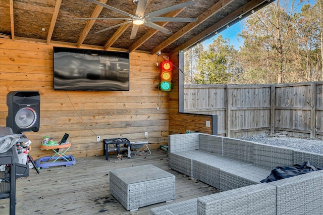 deck featuring ceiling fan and outdoor lounge area