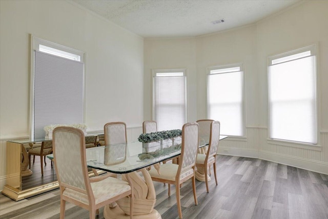 65 W Calhoun St, Wadley, GA 30477 - dining space with a textured ceiling and light hardwood / wood-style flooring