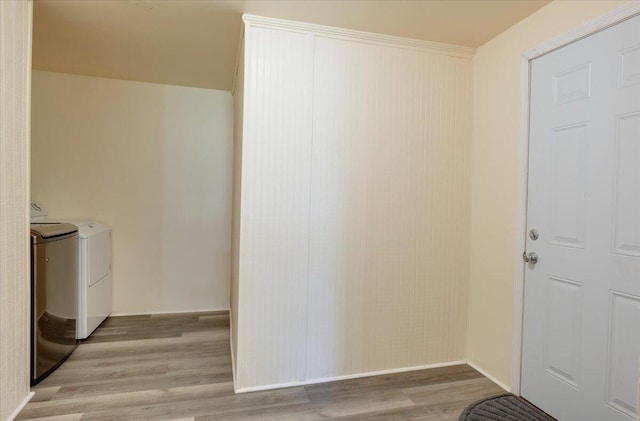 65 W Calhoun St, Wadley, GA 30477 - clothes washing area featuring washer and clothes dryer and light hardwood / wood-style floors