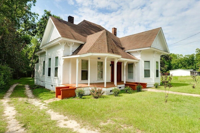 65 W Calhoun St, Wadley, GA 30477 - view of front of home with covered porch and a front lawn