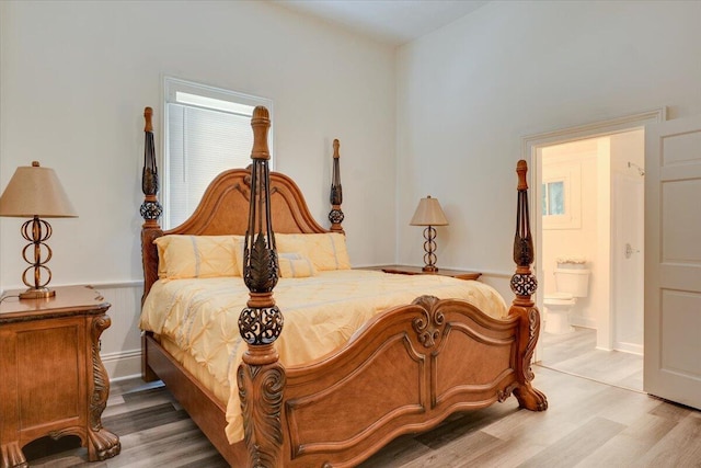 65 W Calhoun St, Wadley, GA 30477 - bedroom featuring hardwood / wood-style floors and ensuite bath
