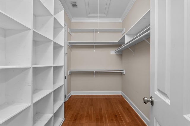 4120 Shady Oaks Dr, Martinez, GA 30907 - spacious closet with attic access and wood finished floors