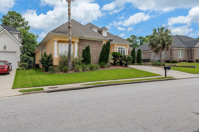 4120 Shady Oaks Dr, Martinez, GA 30907 - view of front of property with a front lawn, concrete driveway, and roof with shingles