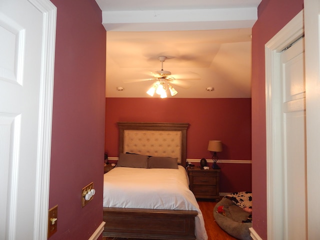 bedroom featuring ceiling fan and dark hardwood / wood-style flooring