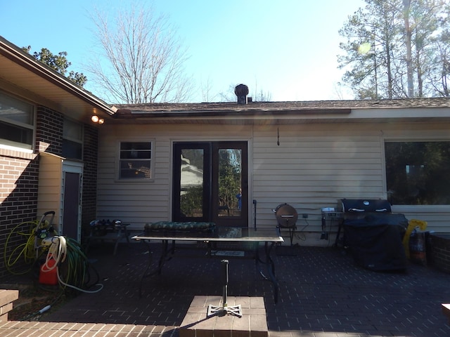 exterior space with a patio and area for grilling