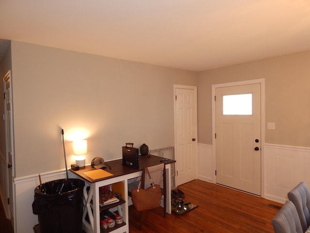 foyer with dark hardwood / wood-style floors