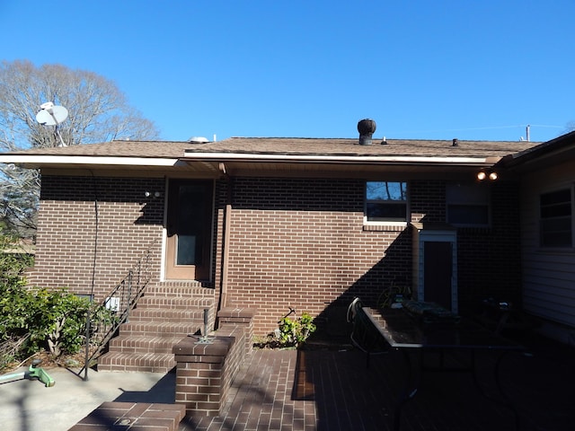 entrance to property with a patio