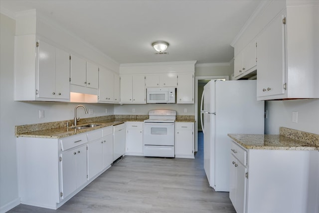 301 Cobblestone Ct, Martinez, GA 30907 - kitchen with white appliances, white cabinetry, light wood-style floors, light stone counters, and ornamental molding
