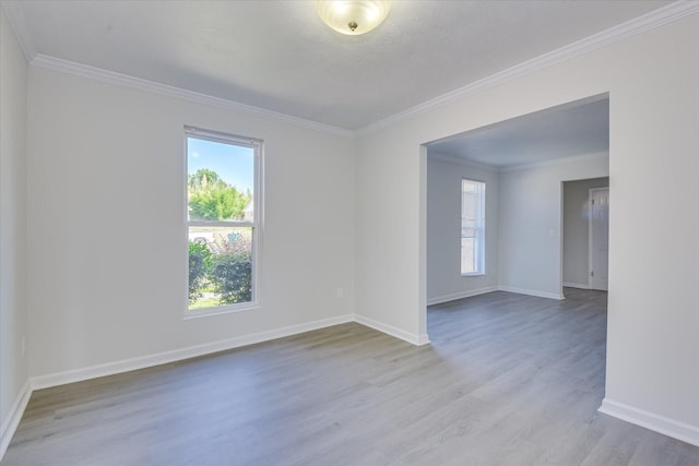 301 Cobblestone Ct, Martinez, GA 30907 - unfurnished room featuring healthy amount of natural light, wood finished floors, and crown molding