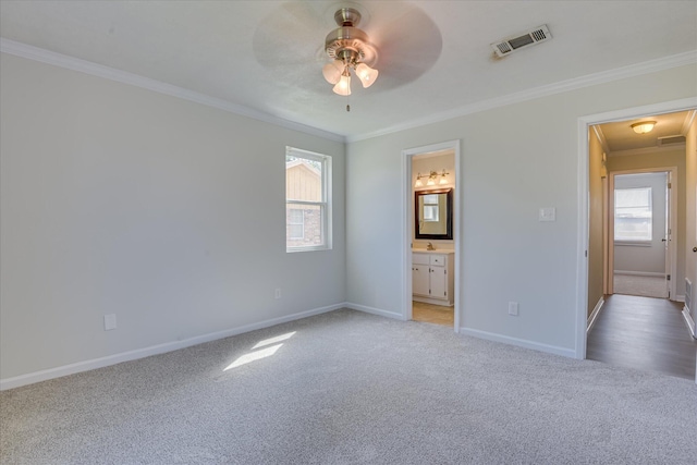 301 Cobblestone Ct, Martinez, GA 30907 - unfurnished bedroom with light colored carpet, crown molding, connected bathroom, and ceiling fan
