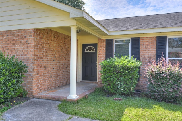 301 Cobblestone Ct, Martinez, GA 30907 - doorway to property featuring brick siding and a shingled roof