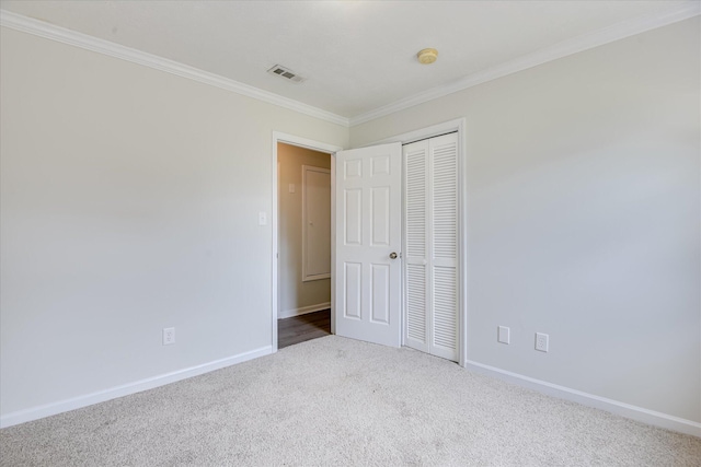 301 Cobblestone Ct, Martinez, GA 30907 - unfurnished bedroom featuring carpet, ornamental molding, and a closet